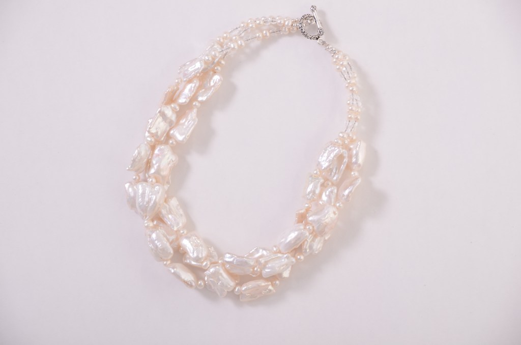 http://everyday-jewels.com/shop/white-freshwater-pearl-twist-necklace/